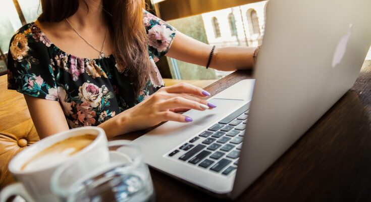Freelancers working in a stylish co-working space in Lahore.