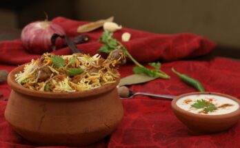 Steaming plate of biryani from a hidden food spot.