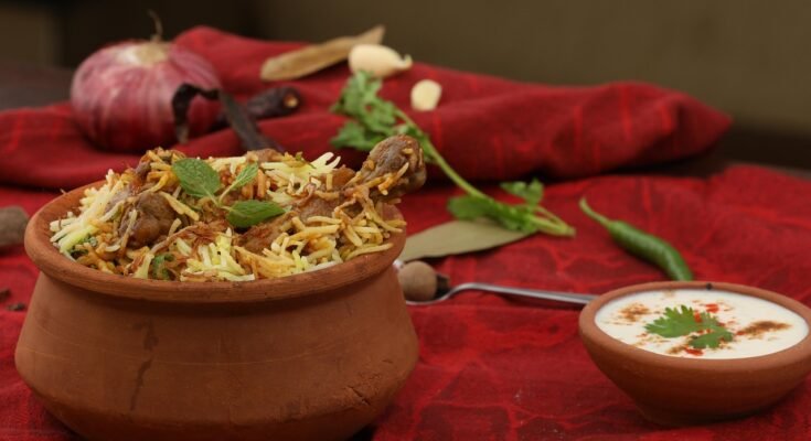 Steaming plate of biryani from a hidden food spot.