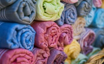 Colorful fabric rolls at a hidden textile market in Lahore