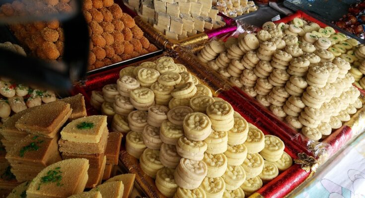People enjoying street food at a local food festival in Lahore.