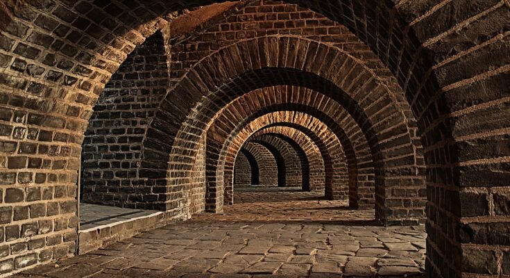 Mysterious foggy street in Old Lahore with vintage architecture