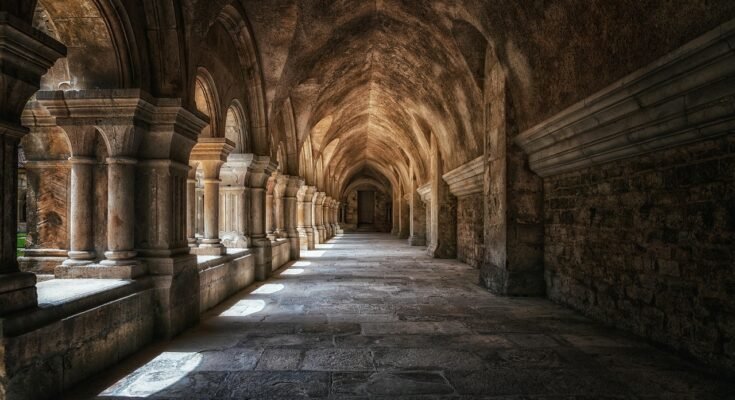 Old haveli with wooden balconies and arched windows in the Walled City of Lahore
